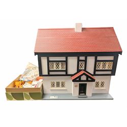 Double fronted two storey dolls house, together with a collection of mid 20th century and later dolls house furniture, H61cm