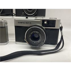 Olympus Pen-EE camera, serial no 415299, with Olympus D.Zuiko 1:3.5 f=2.8cm lens, together with four Olympus Trip 35 cameras, serial nos 4759245, 4257589, 1847727 and 5387611, each with Olympus D. Zuiko 1:28 f=40mm lenses