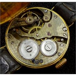 Early 20th century 9ct gold gentleman's manual wind wristwatch, London import marks 1927, on leather strap, 9ct gold ladies wristwatch, on expanding gilt strap and a silver presentation cylinder pocket watch 