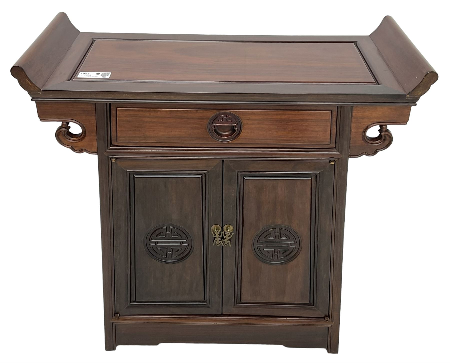 Chinese hardwood altar table, single drawer over double cupboard, two panelled doors carved with Shou motifs 