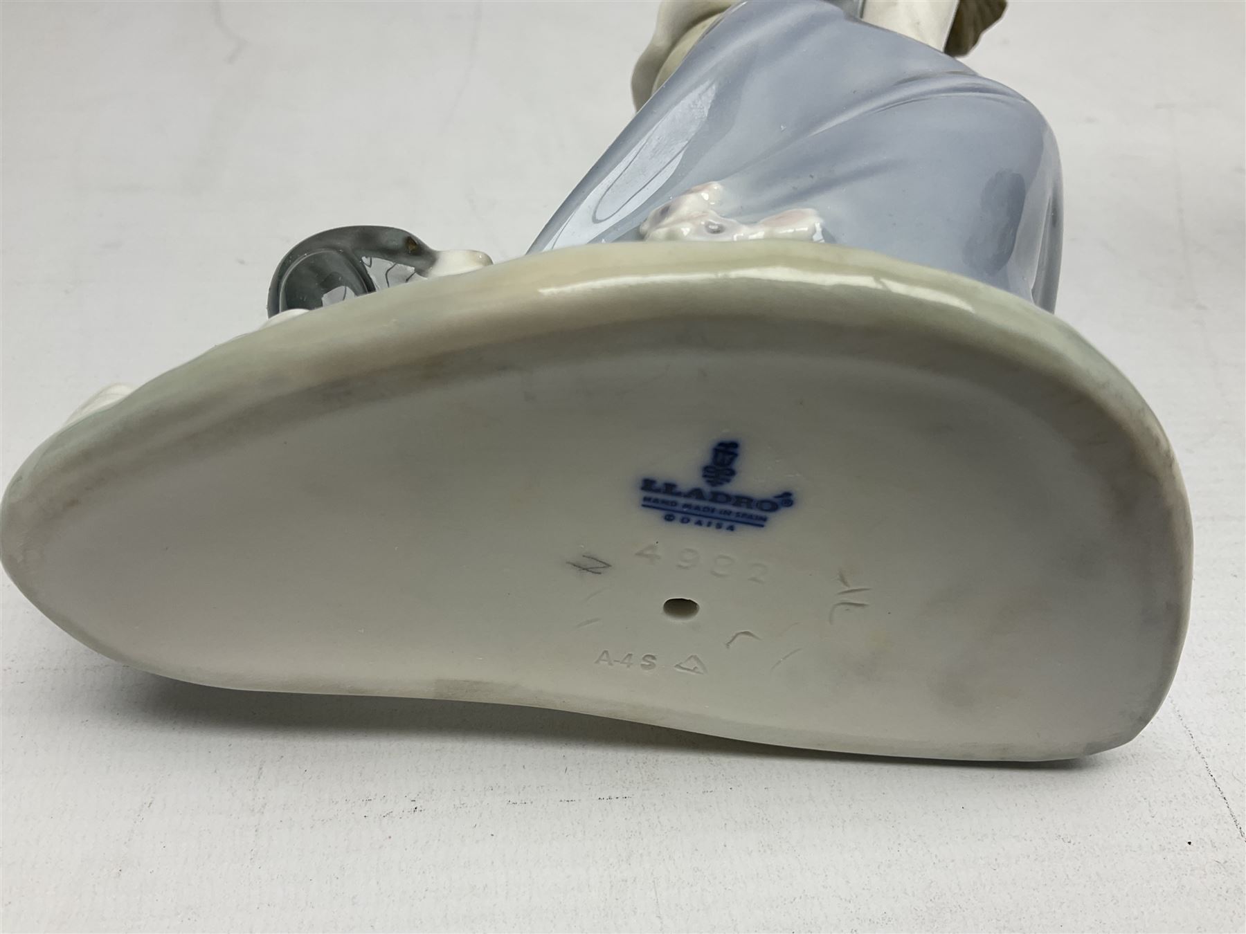 Six Lladro figures, comprising Naughty Dog no 4982, Best Friend 7620 and My Buddy no 7609, Kitty Confrontation no 1442, It Wasn't Me no 7672 and Rabbit Eating no 4772, three with original boxes, largest example H22cm