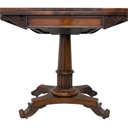 William IV rosewood card table, rounded rectangular swivel and fold-over top with plain frieze, with carved scrolled brackets above stop-fluted column with moulded collar on quadriform base with scrolled feet 