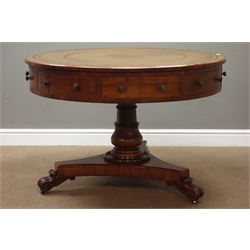  19th century mahogany pedestal drum table, circular top with inset green and gilt tooled leather top, four drawers and four false drawers, turned pedestal on trefoil platform, scroll carved feet with sunken brass castors, D109cm, H74cm  