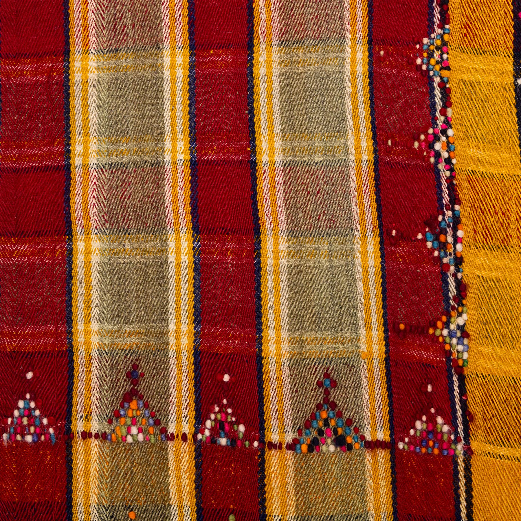 South West Persian Jajim flatweave kilim, field with alternating vertical bands of red, yellow, navy and pale green, decorated with geometric and polychrome raised pile accents, fringe ends 