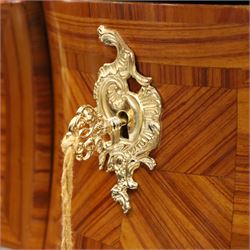 Colombo Mobili - Italian Louis XV design kingwood and marquetry bombé commode chest, the shaped marble top with moulded edge, fitted with an assortment of three shaped short drawers over two long, each with parquetry veneered facias and rocaille shaped gilt metal handles and escutcheons, flanked by gilt metal cartouche mounts with scroll and foliate detail, shaped apron on splayed bracket feet