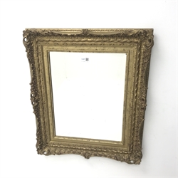 Swept gilt framed bevel edge mirror, W54cm, H65cm
