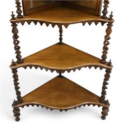 Victorian mahogany five-tier corner whatnot, raised and pierced back of scrolling foliate design, over two tiers with mirror backs and pear-drop moulded aprons, united by pierced spiral-turned uprights, on turned feet