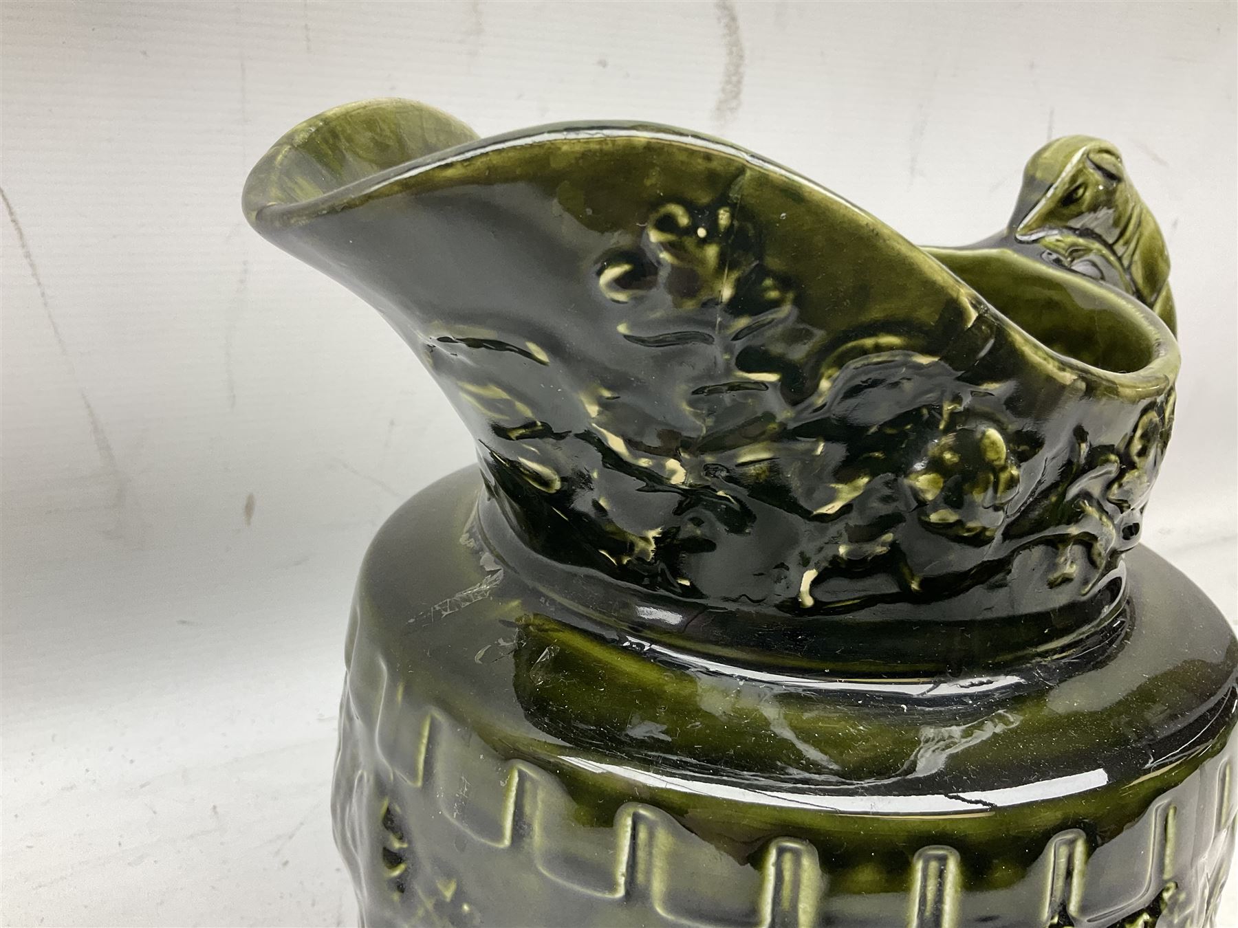 Three jardinières comprising West German Gerz example decorated in relief, Doulton Slaters example with frilled everted rim and a majolica example, and a further two Arthur Wood majolica jugs (5)