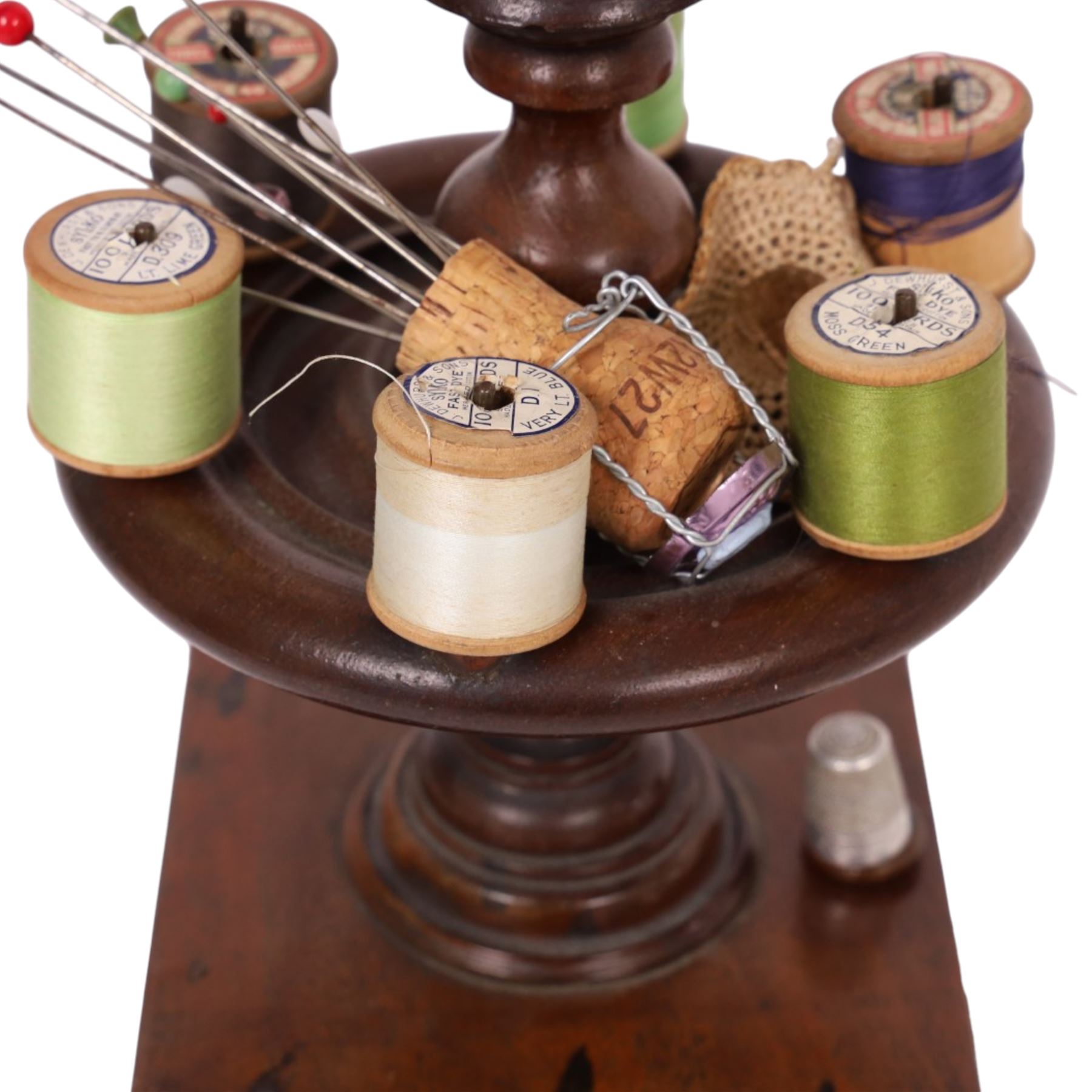 Victorian mahogany bobbin stand, together with pin wheel pin cushion, hat pins other sewing related items, stand H32cm