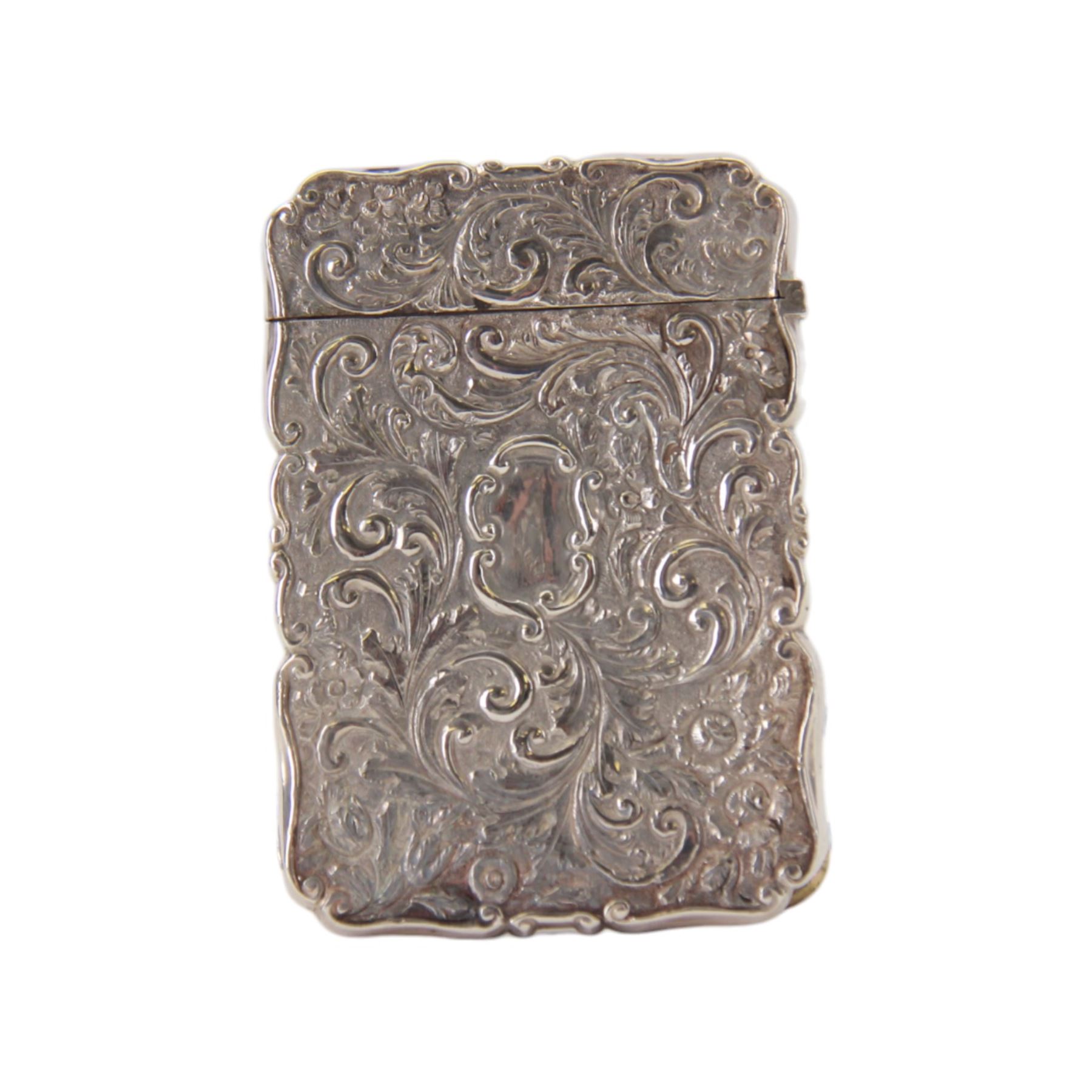 Victorian silver castle-top card case, of rectangular form with scrolling sides, relief embossed with the St Paul's Cathedral and surrounded by foliate scrolls, with vacant cartouche to reverse, hallmarked Nathaniel Mills, Birmingham, probably 1847, H8.5cm W6cm
