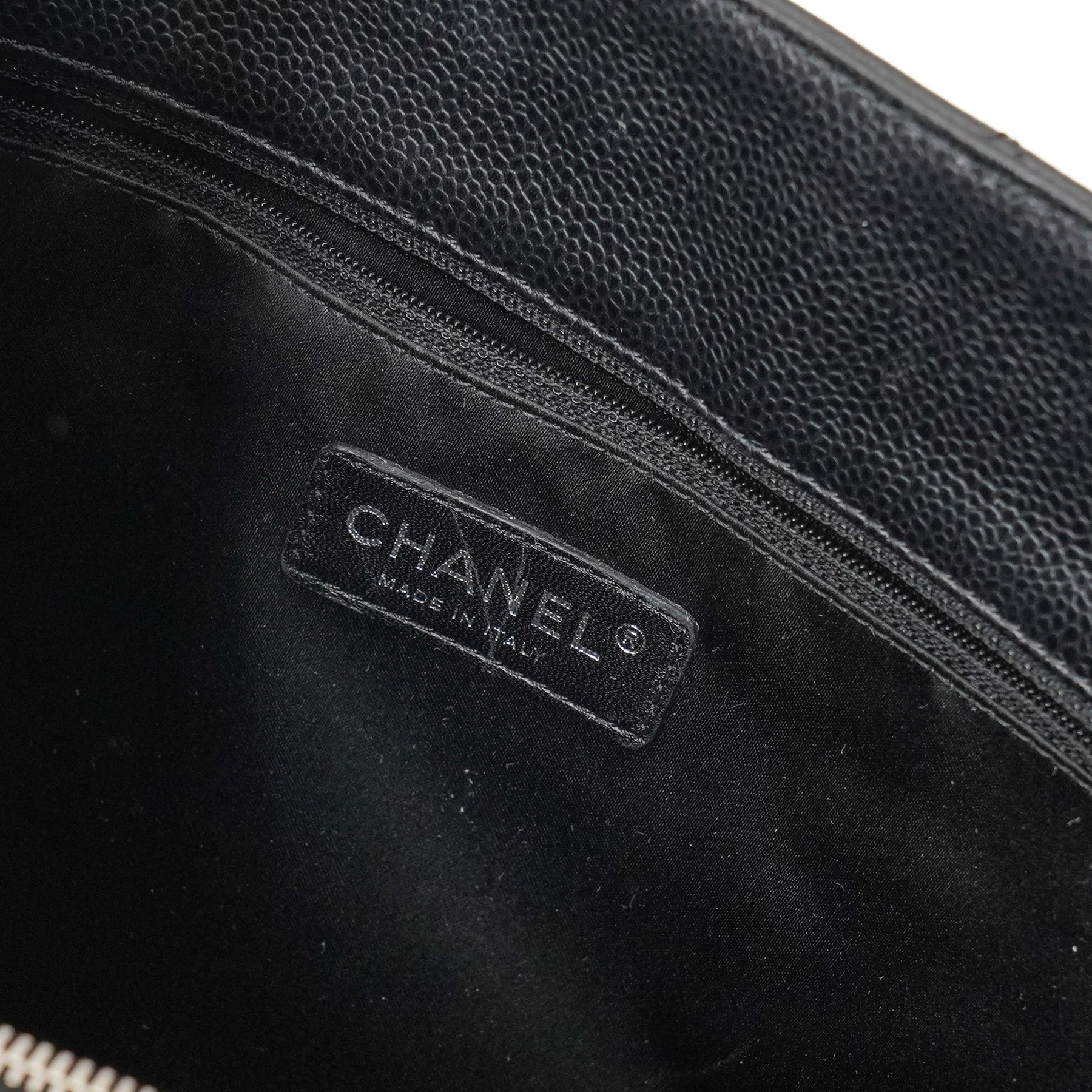 Chanel - black GST Grand Shopping Tote, caviar leather with classic diamond quilting and large embroidered CC logo to the centre front, with polished silver-tone hardware, a rear patch pocket, chain and leather handles, and an open top with three main interior compartments, 2009-2010, serial number 13547470