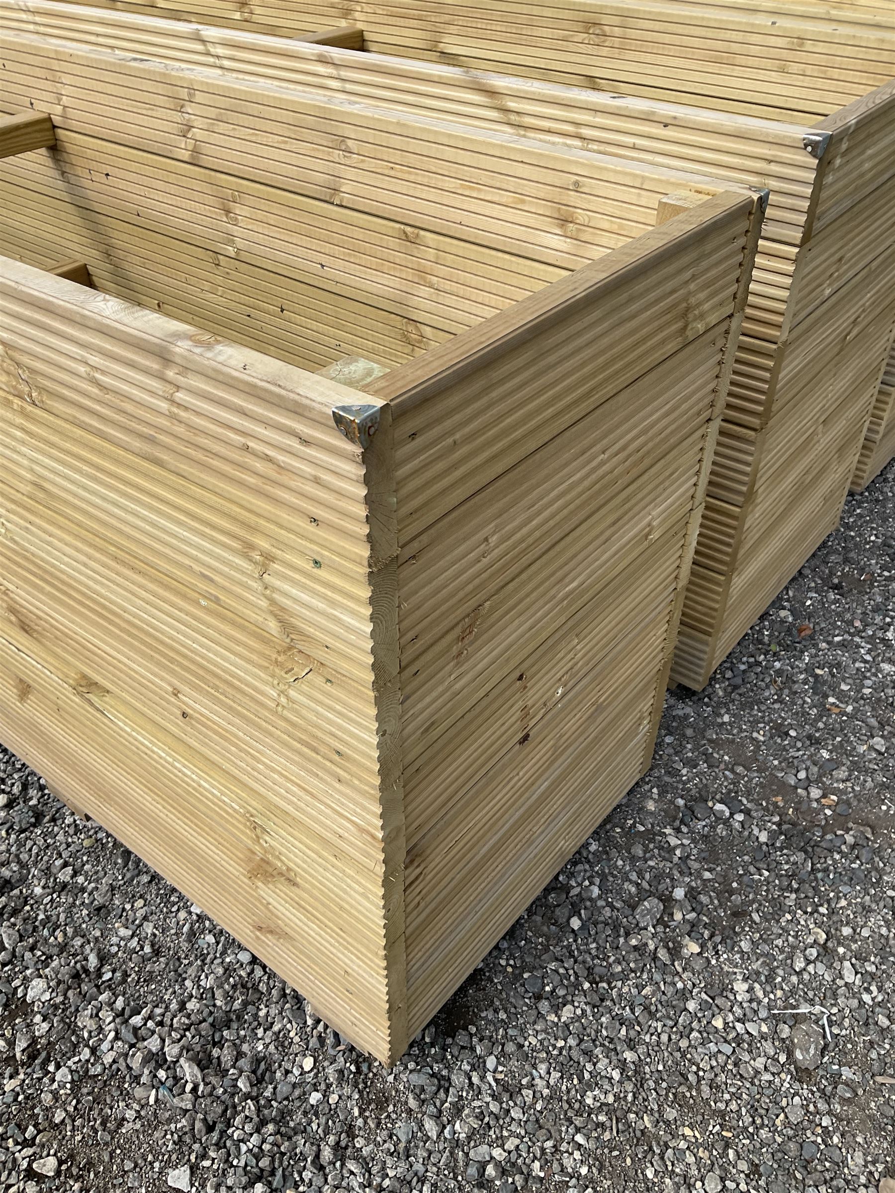 Large Ruby rectangular tanalised timber planter  - THIS LOT IS TO BE COLLECTED BY APPOINTMENT FROM DUGGLEBY STORAGE, GREAT HILL, EASTFIELD, SCARBOROUGH, YO11 3TX