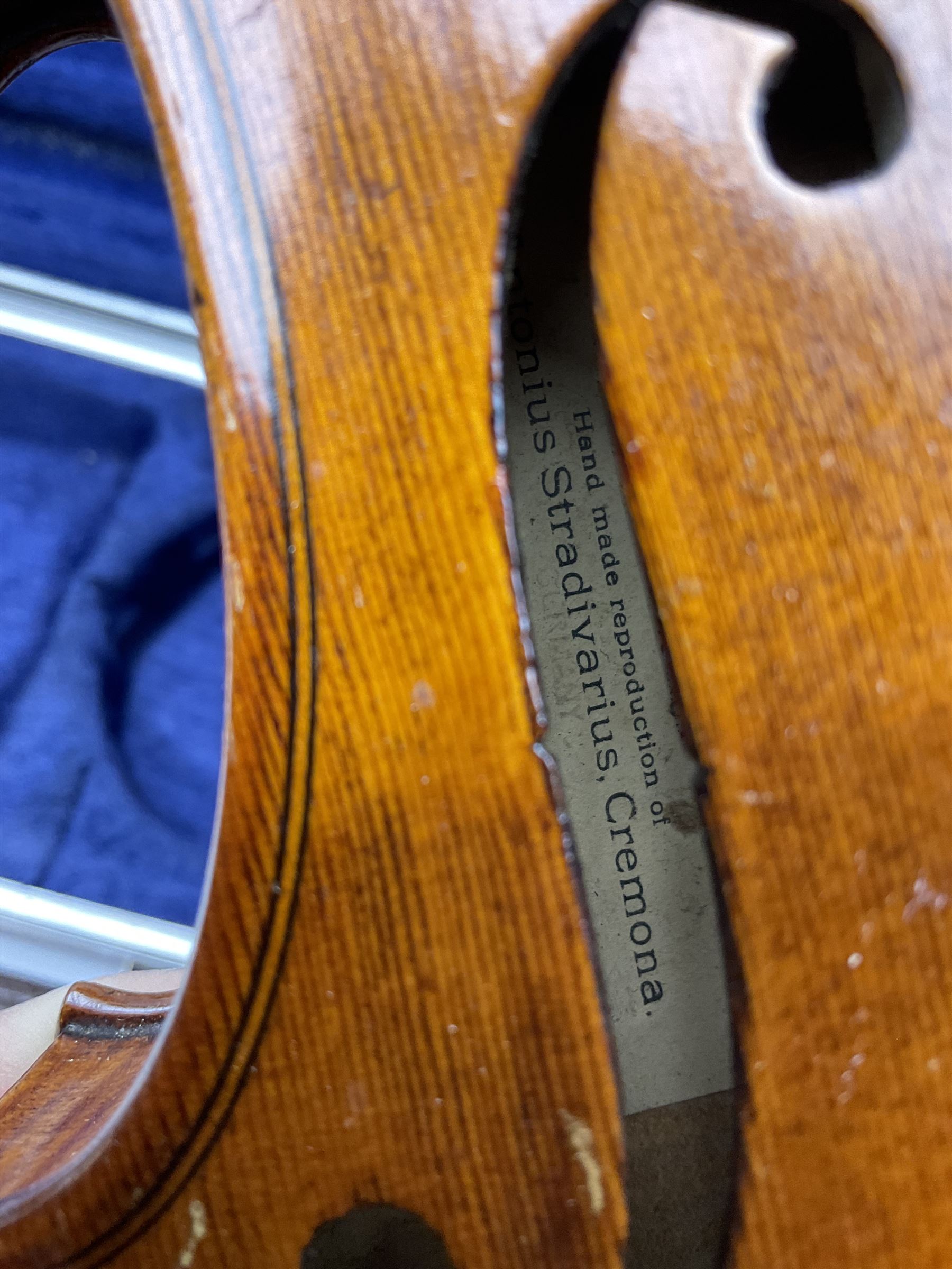 Early 20th century German Ernst Kreusler violin with 36cm two-piece maple back and ribs and spruce top, bears label 'Ernst Kreusler Dresden Anno 1925  Hand made reproduction of Antonius Stradivarius Cremona', overall L59cm; in hard carrying case