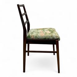 Richard Hornby for Fyne Ladye - mid-20th century afromosia teak dining table, tapered rectangular top with fluted edge and recess for spare leaf, raised on slender legs, teak framed chairs, of ladder back design, with drop-in seat, upholstered seat, with tapered front legs and slightly raked rear legs, retailed by Heals of London, table extended width 181cm depth 86cm height 74cm - chairs width 48cm depth 41cm height 87cm 
