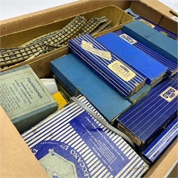 Hornby Dublo - quantity of three-rail electric track including various straights, curves, turntable, manual and electric points, diamond crossing, railer etc; and two controllers; predominantly boxed