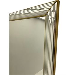 Large rectangular wall mirror, in cushion mirrored and gilt frame