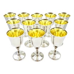 Set of twelve silver goblets with gilt interiors by W I Broadway & Co, Birmingham 1974, approx 64oz