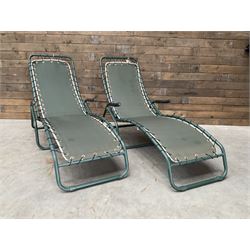 Pair metal framed folding sun loungers