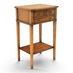 Georgian design mahogany lamp table, fitted with three small drawers, raised on square sup...