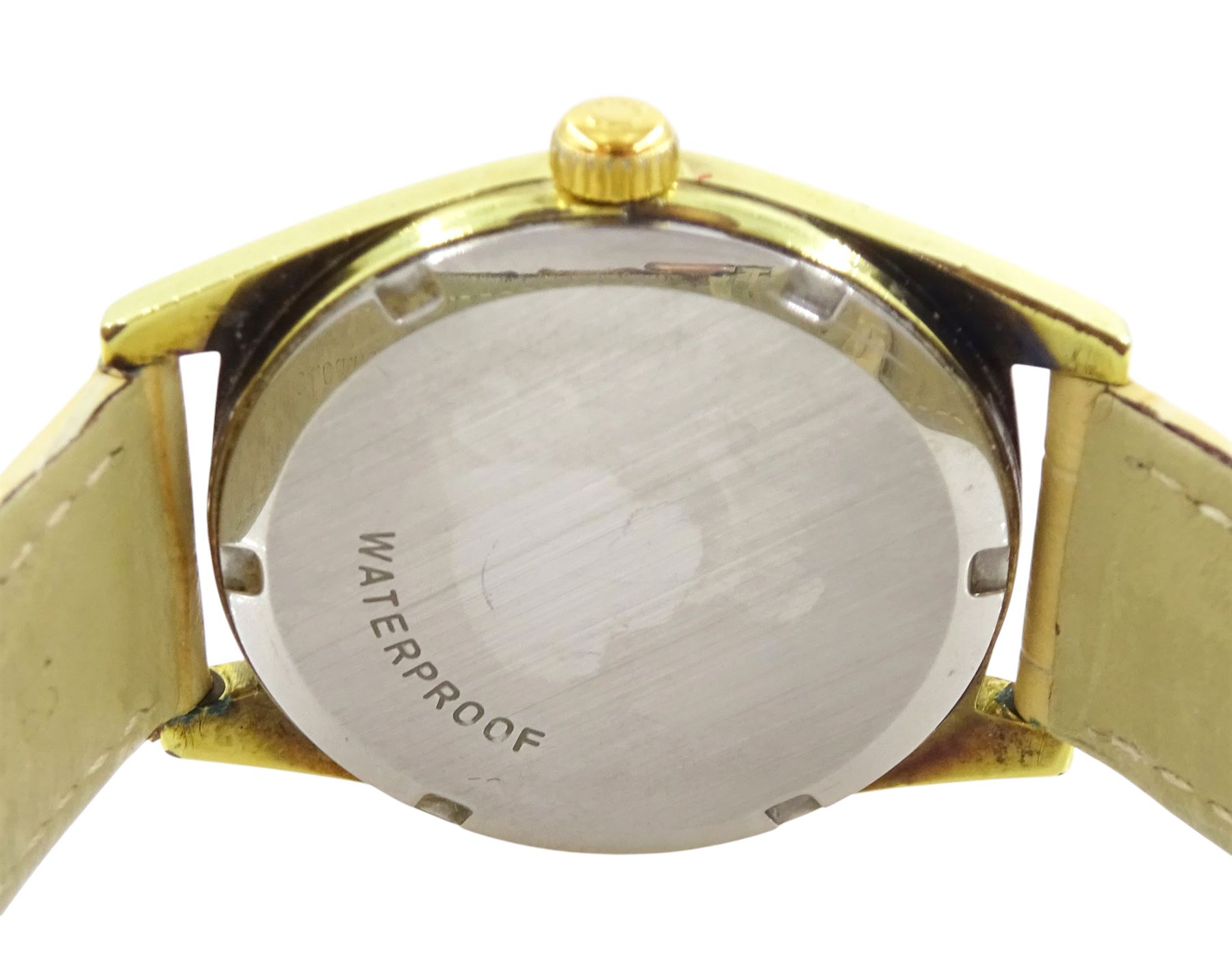 Omega Genève gentleman's stainless steel and gold-plated manual wind wristwatch, Ref. 135.0041, silvered dial with baton hour markers, on cream leather strap, with Omega gilt buckle, boxed with papers dated 1974