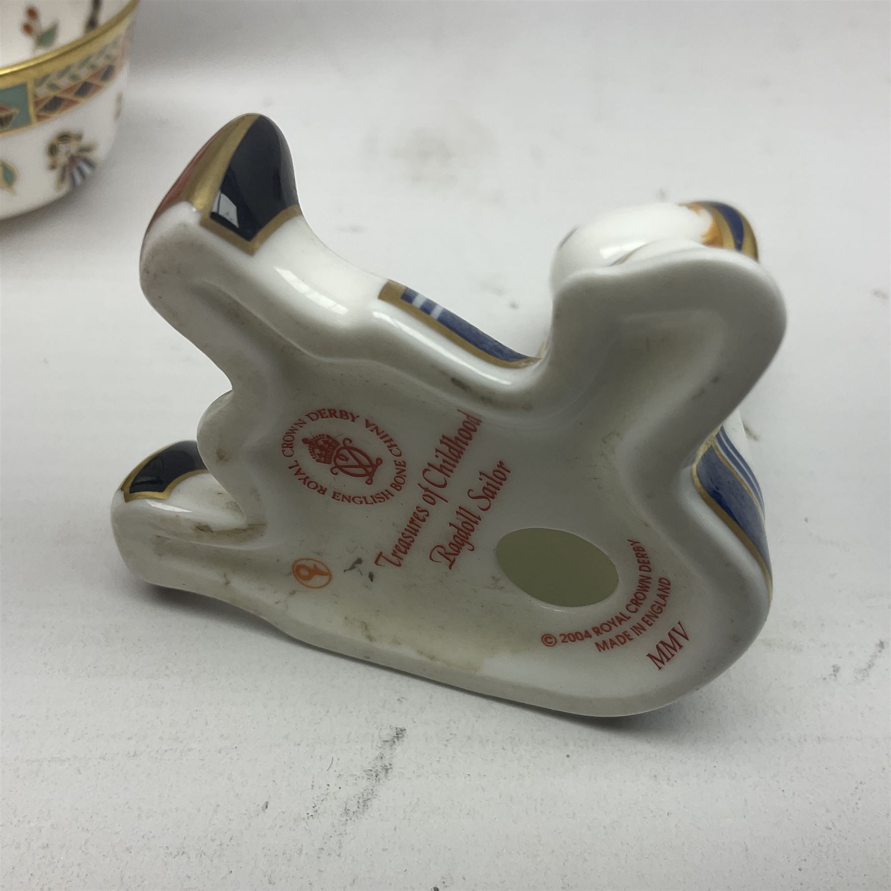 Royal Crown Derby Treasures of Childhood cabaret set, comprising tray, milk jug, sucrier, teacup and saucer, together with two Royal Crown Derby Treasures of Childhood paperweights Fleur and Ragdoll Sailor and Teddy bear paperweight, all paperweights are without stoppers