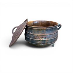 Three South African cast iron graduating cooking pots with lids and handles. Size shown for the largest