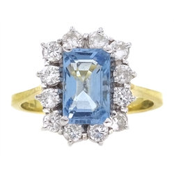  18ct gold emerald cut aquamarine and round brilliant cut diamond cluster ring, hallmarked 18ct  