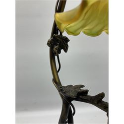 Art Nouveau style lamp in the form of a woman on a swing, with a green mottled shade, upon a marble base H52cm