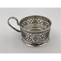 Early/mid 20th century Persian silver tea service, comprising circular serving tray, teapot, twin handled sucrier and cover, milk jug, five tea glasses with six silver holders, six tea spoons, and pair of sugar tongs, each profusely chased with foliate arabesque decoration, each bearing marks including 84 for 840 fineness, tray D40cm, teapot H16cm