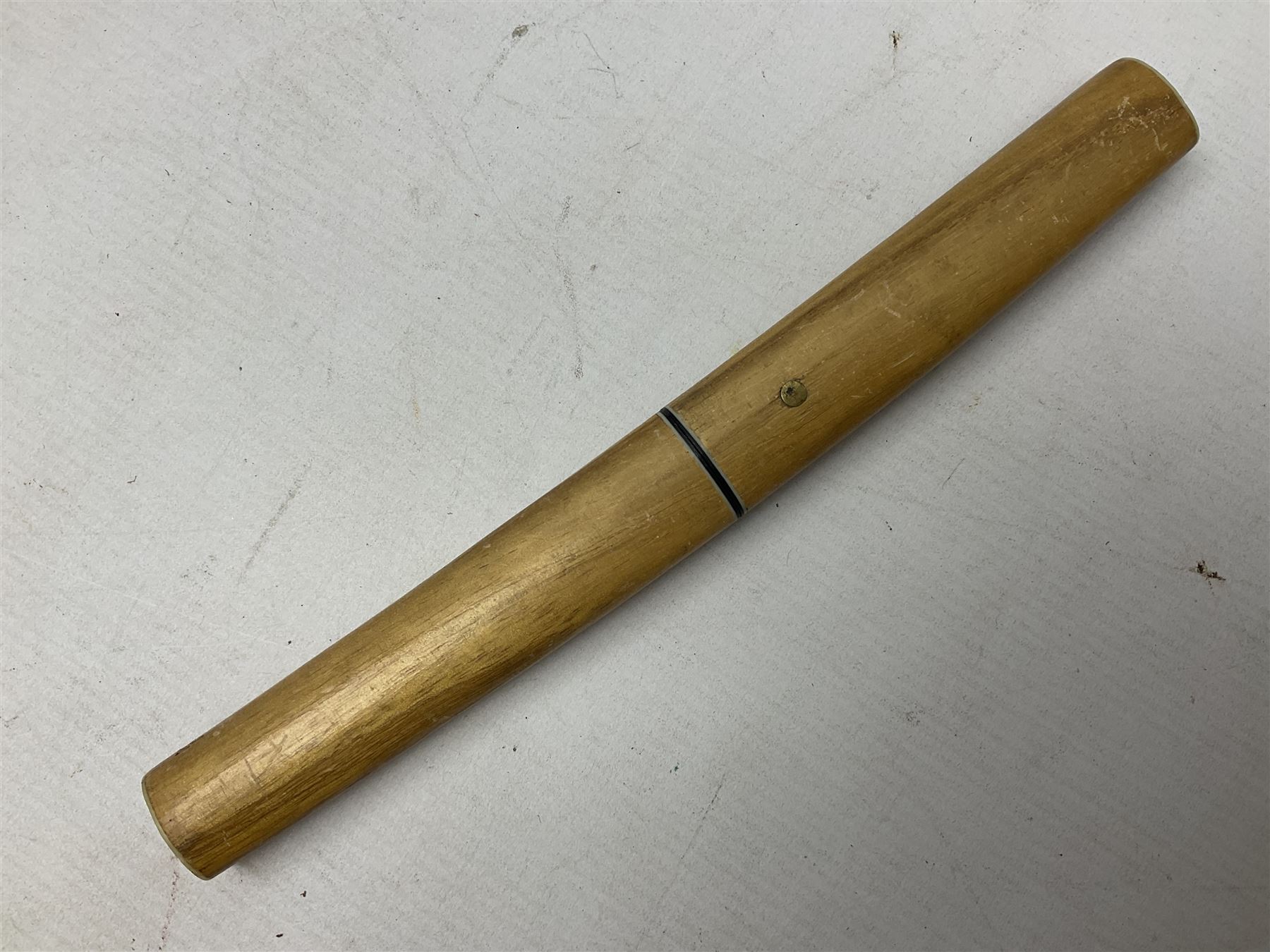 Eastern dagger with 14.5cm ornate fullered blade and nickel mounted horn grip; in nickel mounted ebonised wooden scabbard L25,5cm overall; another smaller Eastern dagger with animal head pommel and nickel mounted leather scabbard; three small sheathe knives with simulated antler grips; letter opener in the form of a German hunting knife with hoof grip; and Japanese wooden Floating Fish Knife with stainless steel blade (7)