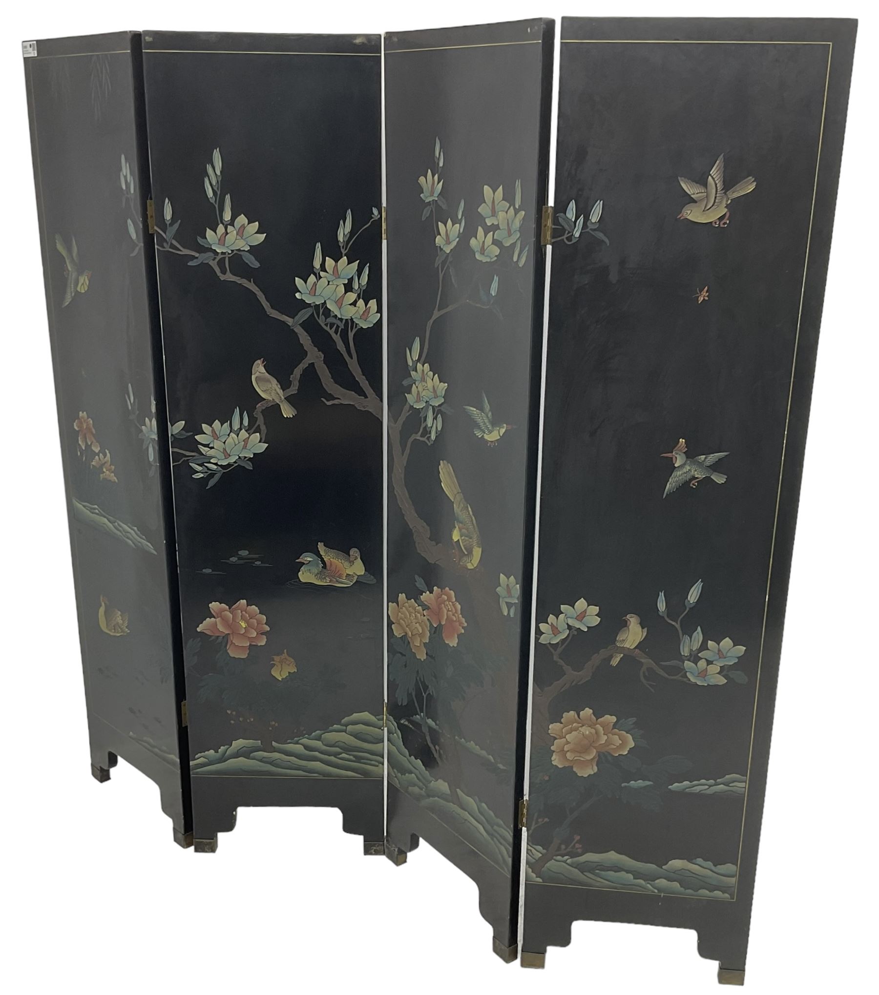 Chinese four-panel folding room screen, black lacquered with a naturalistic scene decorated with trees, birds and flowers