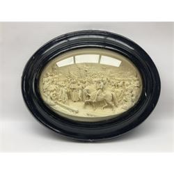 Justin Mathieu; oval high relief plaque depicting a battle scene, within frame H36cm