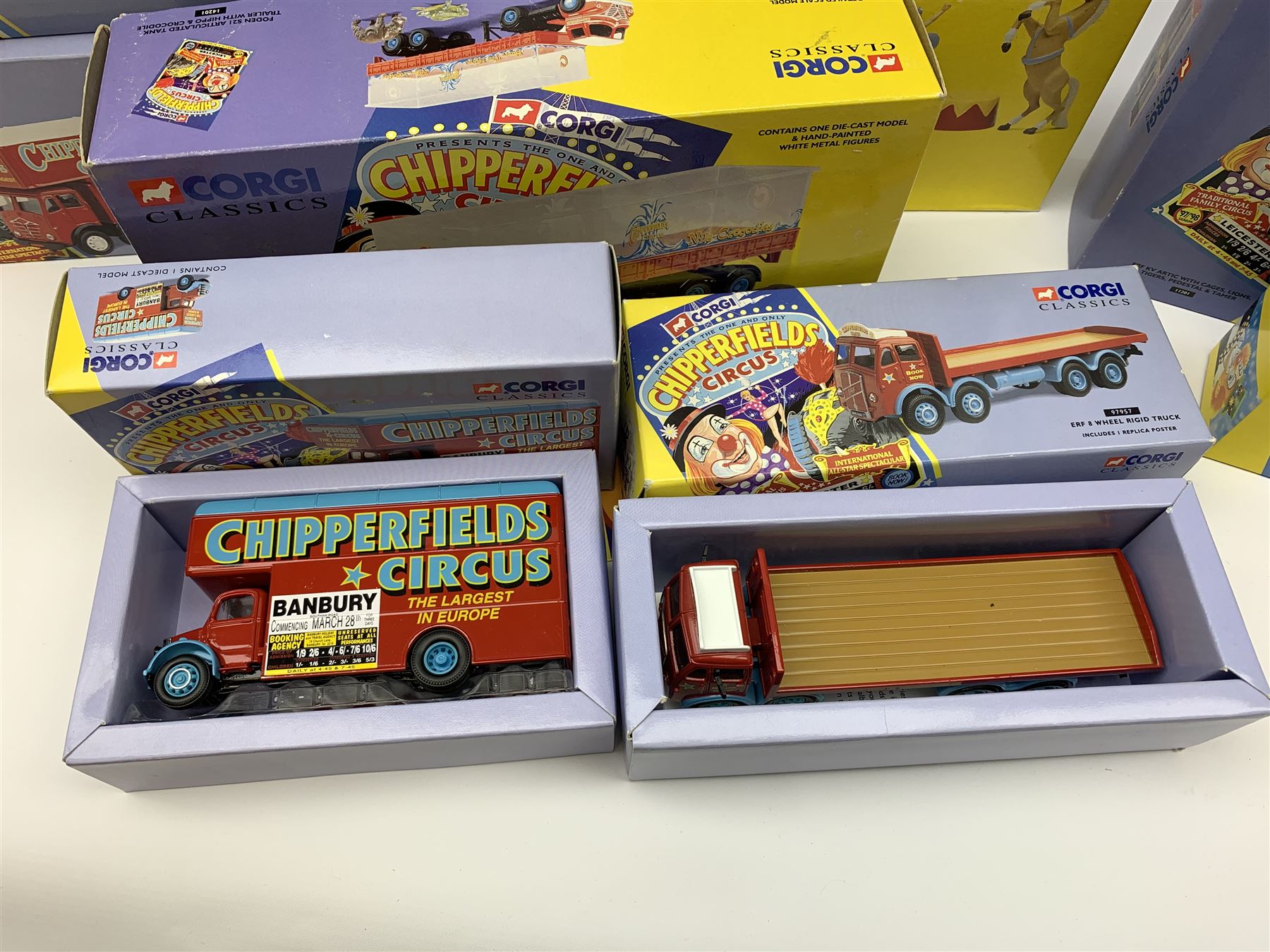Sixteen Corgi limited edition Chipperfields Circus models - 07202 Land Rover Public Address & Clowns; 11201 ERF KV Artic with cages lions, tigers, pedestal & tamer; 14201 Foden S21 Articulated Tank Trailer with hippo & crocodile; 17801 Scammell Constructor Cannon & Ringmaster; 31703 Land Rover, Morris Minor Pick-Up, Thames Trader & AEC Fire Engine; 31901 Mary Chipperfield's Liberty Horses; 96905 Advance Booking Vehicle; 97022 AEC Regal Living Quarters; 97092 Bedford Pantechnicon Billy Smee Wardrobe; 97915 Scammell Highwayman with two trailers; 97887 Bedford O Articulated Horsebox; 97888 Foden Closed Pole Truck with Caravan; 97889 AEC Cage Truck & Trailer; 97896 AEC Pole Truck; 97957 ERF 8-Wheel Rigid Truck; and Set No.1 Six Circus Figures; all mint and boxed with certificates, some with posters, and brochure (16)