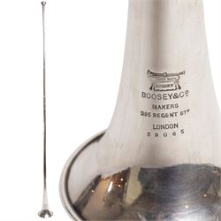 Boosey & Co. (295 Regent Street London) - Late Victorian silver plated sectional coaching horn of tapering form with flared bell, the mouthpiece stamped Vincent Bach Corp 7C surmounting the long tube with two ferrules, stamped to the bell with serial no. 39065, L128cm; with associated leather sleeve case