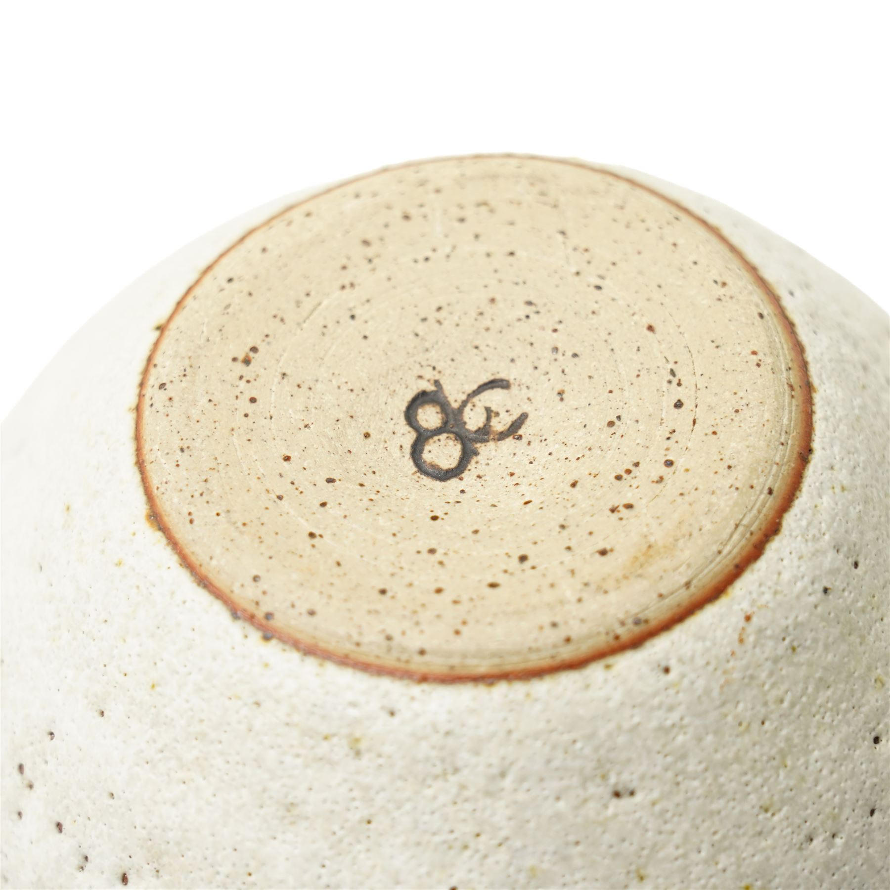 Sarah Butler and Martin Clark: Three works, comprising two bowls and a sleeve vase, each with incised potters mark to bases, and one with Heals mark, sleeve vase H24cm (3)