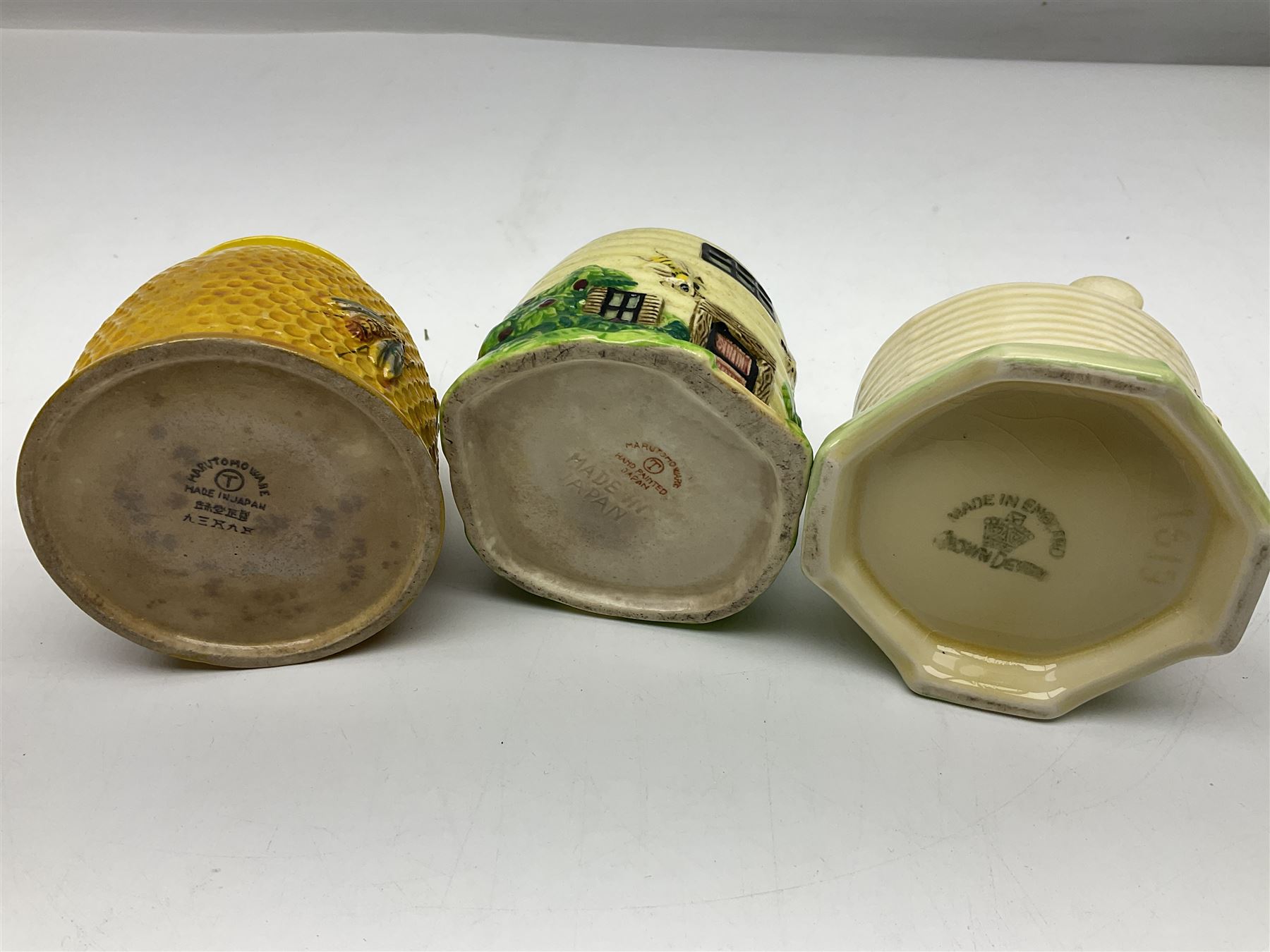 Large collection of honey pots, of various shapes, to include examples from Crown Devon, Marutomo ware, W.H Gloss, Goebel etc 