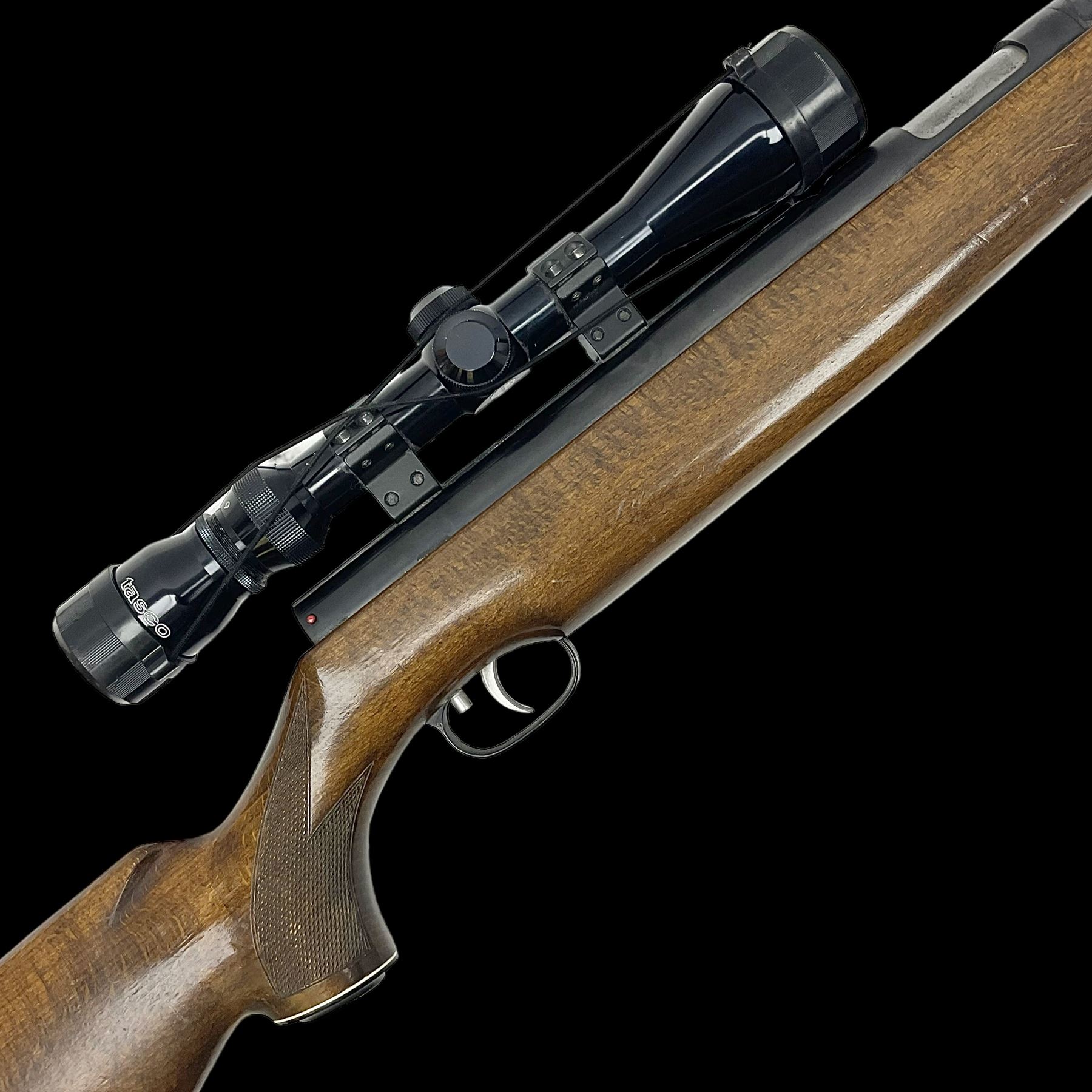Weihrauch model HW 77 K  .22 air rifle with under lever action, beech stock with chequered pistol grip and Tasco WA39x40-1 scope, serial no.1283661 L102cm overall NB: AGE RESTRICTIONS APPLY TO THE PURCHASE OF THIS LOT