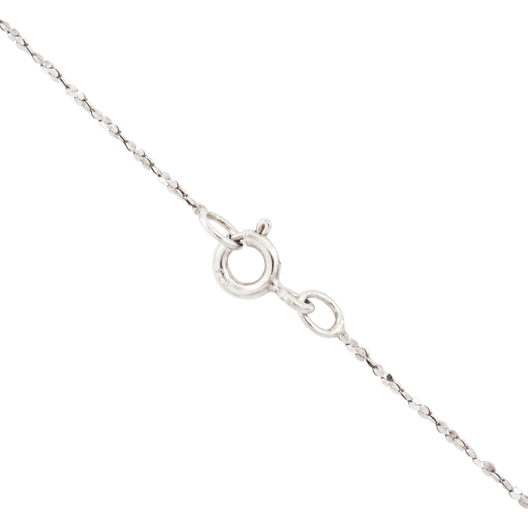 18ct white gold emerald and diamond cluster pendant, three graduating oval cut emeralds, each surrounded by round brilliant cut diamonds, Birmingham 2010, on a fine silver chain, total emerald weight approx 1.05 carat, total diamond weight approx 0.55 carat