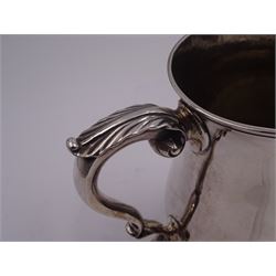 Early George III silver mug, of plain bellied form with acanthus capped scroll handle, upon a stepped circular foot, hallmarked Fuller White, London 1762, H12cm, approximate weight 10.35 ozt (322.1 grams)