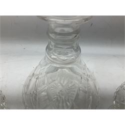 Stuart Crystal decanter and stopper, two Spiegelau brandy glasses, all marked beneath, and a stained oak stand raised on four feet