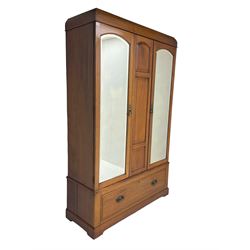 Edwardian walnut double wardrobe, fitted with two bevelled mirror panelled doors, single drawer to base