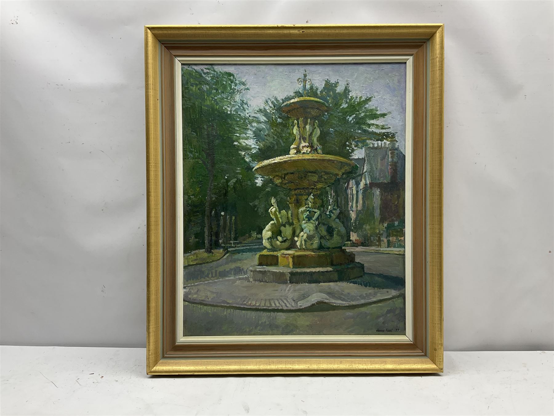 James Neal (Northern British 1918-2011): 'Fountain in Marlborough Avenue Hull', oil on board signed and dated '77, 57cm x 47cm
Provenance: East Yorkshire private collection purchased from the artist. Neal was accepted at St Martin's School of Art in 1932, aged 14. In 1958 he moved to Hull as Lecturer in Painting and Drawing at Hull Regional College of Art, then becoming Senior Lecturer in the History of Art. Over the next fifty years he became well known for painting scenes around the Hull area. Ferens Art Gallery, has twice mounted major retrospective exhibitions of James Neal's work
