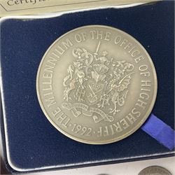 The Royal Mint 1992 commemorative sterling silver medal 'Struck to Celebrate the Millennium of the Office of High Sheriff' weighing approximately 150 grams, cased with certificate, 'Winston Churchill 1874-1965' commemorative medal housed in a Spink and Son case, various commemorative crowns, pre-decimal coinage etc