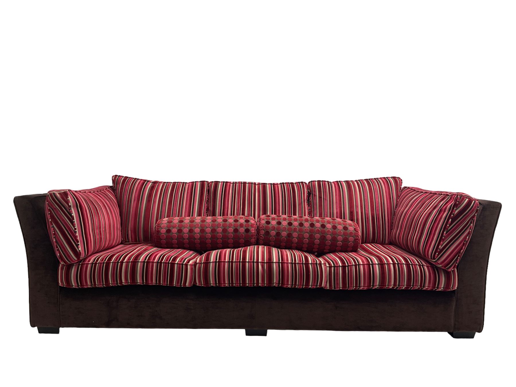 Collins & Hayes - grande three seat sofa upholstered in chocolate fabric, the loose cushions upholstered in textured fuschia stripes with contrasting spotted bolster cushions