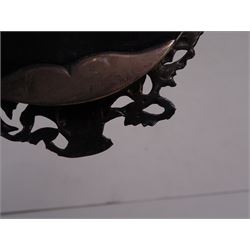 Continental silver miniature dressing table/wall mirror, of oval form with bevelled mirror plate, surrounded by a bead and dart rim, with pierced scrolling floral border with a standing cavalier to either side and the bust of a cavalier to the base, H17.7cm