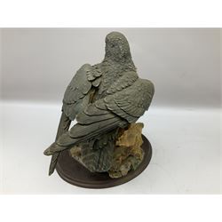 Country Artists figure of a peregrine falcon ' Lord of the Skies ' by David Ivey, limited edition, H44cm, together with two Sherratt and Simpson figures, both of peregrine falcons perched on branches. 