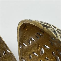 Modern silver limited edition Easter egg, no. 70/500, the openwork lattice body decorated with gilded panels of flower heads, opening to reveal a gilt interior, upon silver stand with three scrolling pad feet, each hallmarked St James House Company, London 1979, height including stand 8cm