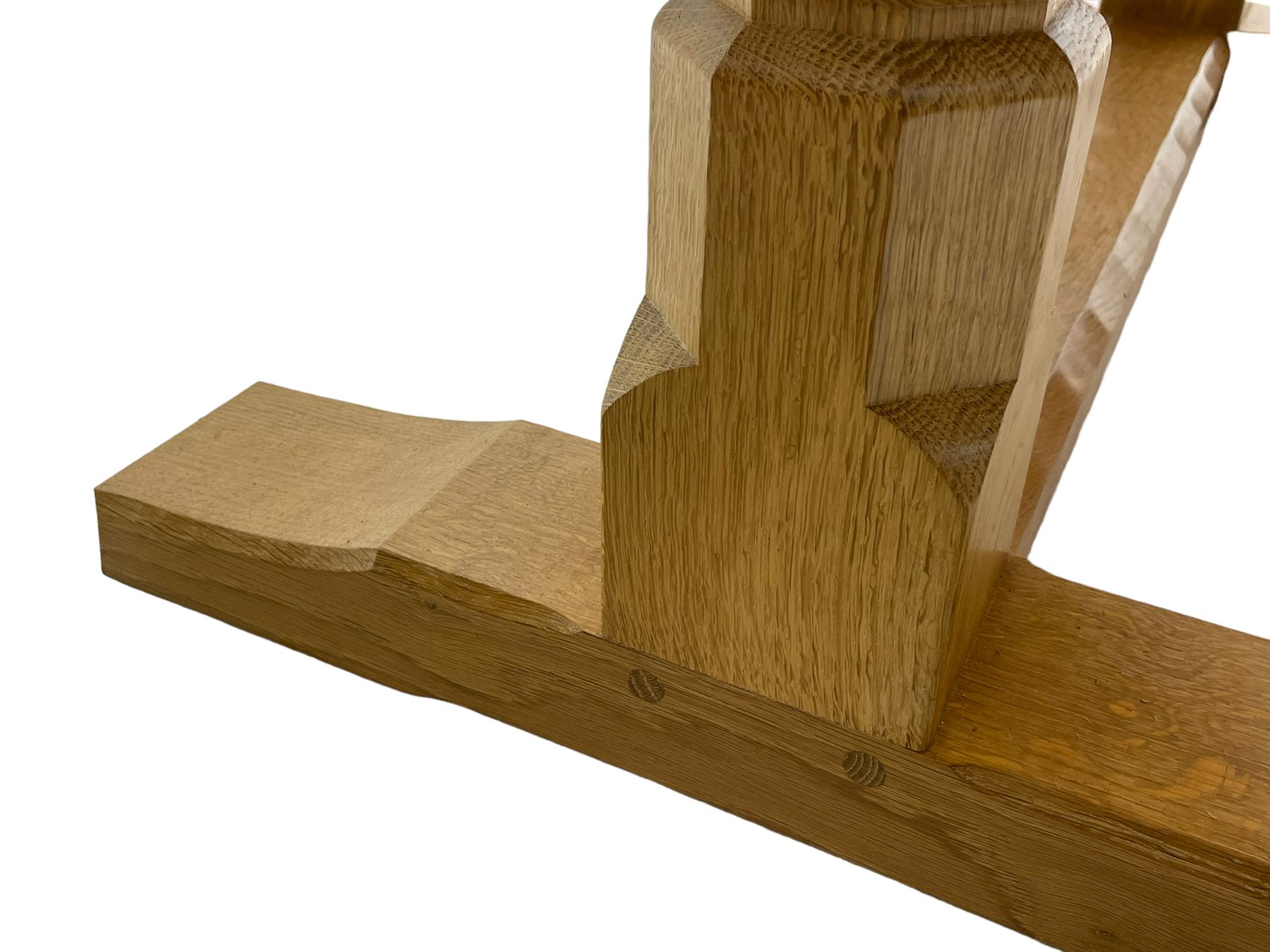 Mouseman - oak dining table, adzed rectangular top on twin octagonal pillar supports, sledge feet united by floor stretcher, by the workshop of Robert Thompson, Kilburn 