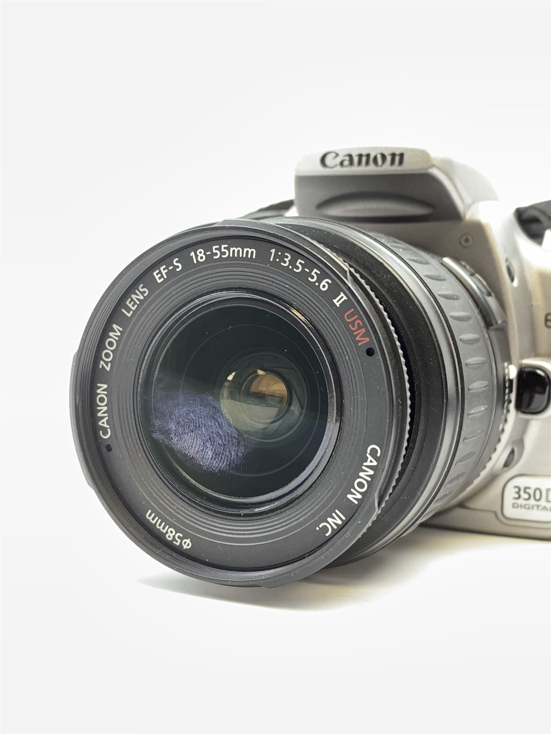 Canon EOS 350D digital camera with 'Canon Zoom Lens EF-S 18-55mm 1:3.5-5.6 II USM', with instruction manual and charger and two further lenses, Canon Ultrasonic 'Canon Zoom Lens EF 35-105mm 1:4.5-5.6' and a Canon Ultrasonic 'Canon Zoom Lens EF 75-300mm 1:4-5.6 III USM'