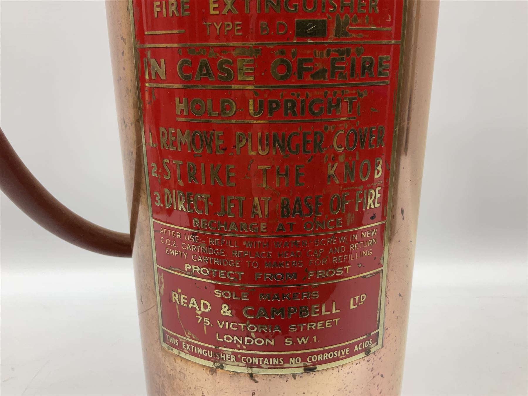 Large copper ‘Waterloo’ fire extinguisher by Read and Campbell Ltd and another Safex example 

